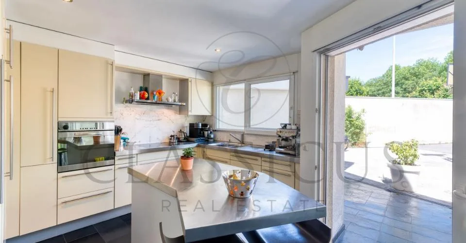 Maison familiale en pignon avec jardin privatif, véranda et 4 stationnements – photo 20 sur 26