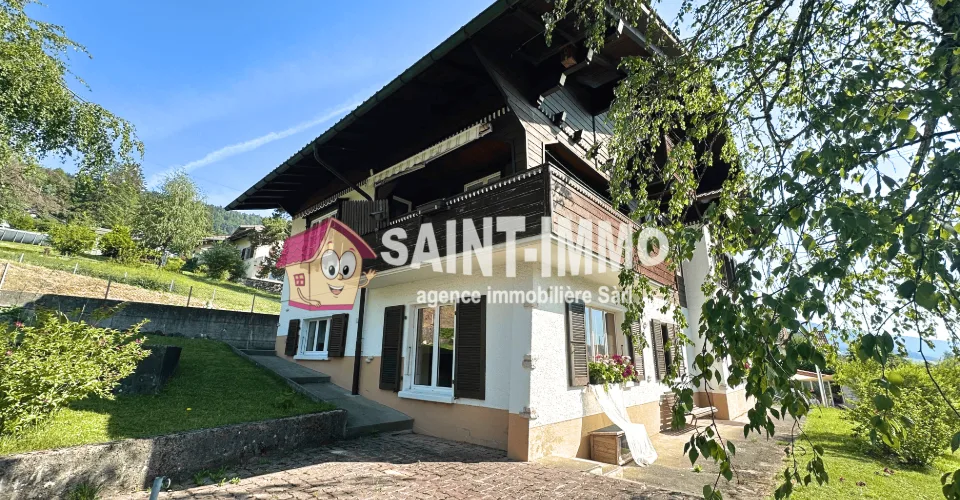 Chalet composé de deux appartements (3 & 6.5 pièces) avec jardin arboré de 840 m2, terrasse et garages – Foto 2 von 25