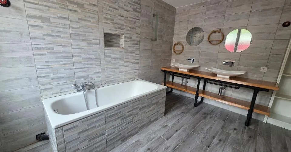 Maison jumelée composée de 5 appartements entièrement rénovés – photo 12 sur 13