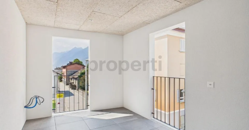 Modern 3.5-room attic apartment with parking and cellar, Biasca – photo 5 of 26