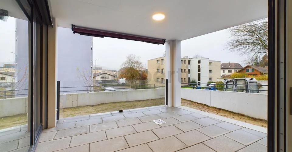 Modern kitchen island, seating area with garden & Minergie standard! – photo 17 of 18
