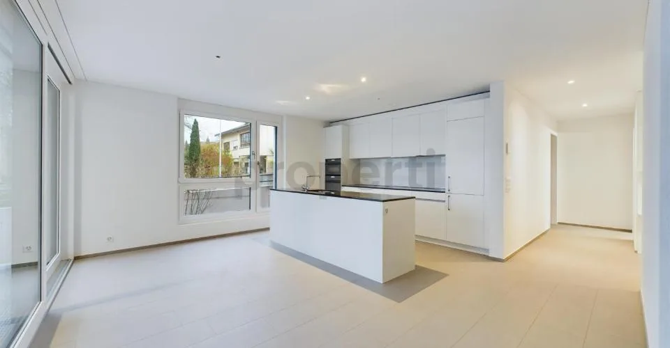 Modern kitchen island, seating area with garden & Minergie standard! – photo 11 of 18