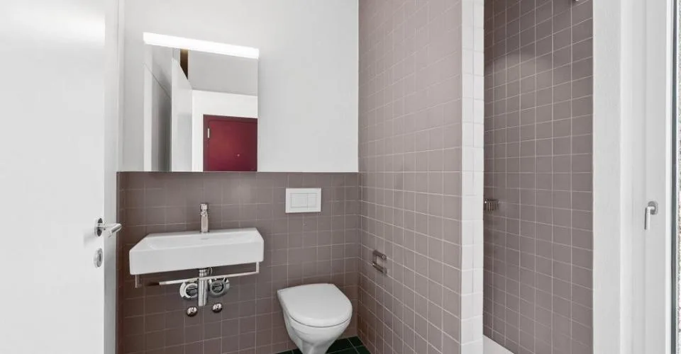 Attraktive und charmante Neubauwohnung mit Sitzplatz an bester Lage – Foto 5 von 6