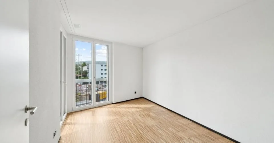 Attraktive und charmante Neubauwohnung mit Sitzplatz an bester Lage – Foto 6 von 6