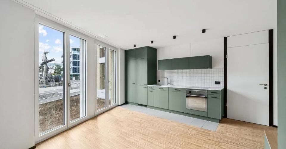 Attraktive und charmante Neubauwohnung mit Sitzplatz an bester Lage – Foto 3 von 6