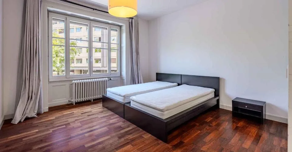 Co exclusivité : Appartement de caractère au coeur des Eaux-Vives – Foto 9 von 12