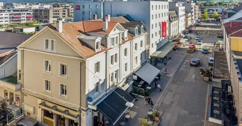 Immeuble de caractère mixte et de rendement au coeur de Delémon – photo 2 of 13
