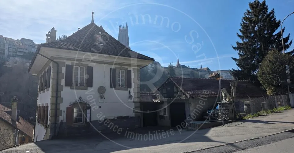 Une demeure de caractère au coeur de la vieille ville de Fribourg – photo 4 of 12