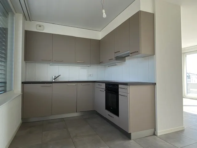 Appartement moderne, 2.5 pièces, centre-ville – Foto 2 von 8