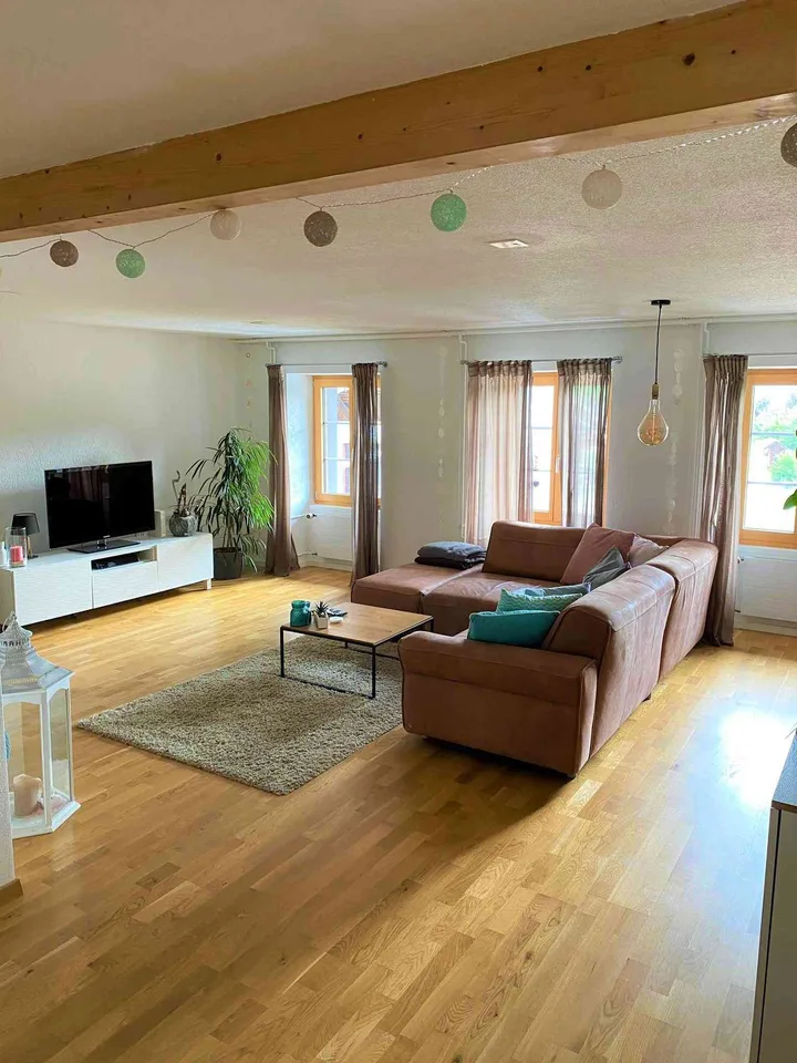 Heimelige Wohnung in Bauernhaus mit Bruchsteinmauer