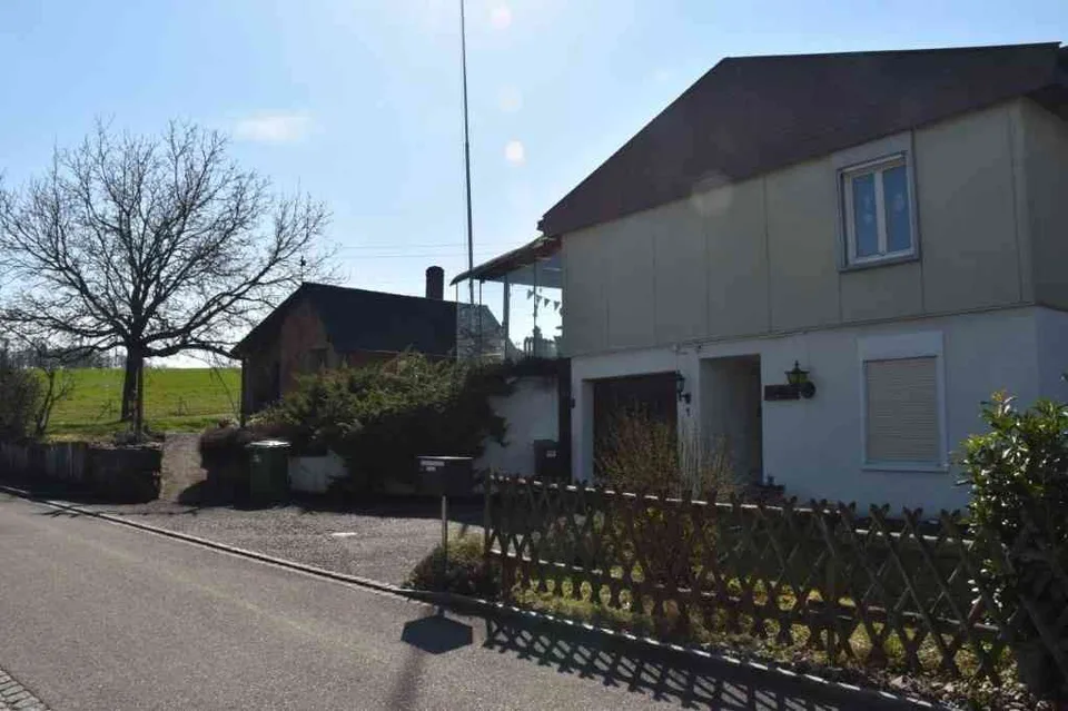 Einfamilienhaus mit eigenem Deich