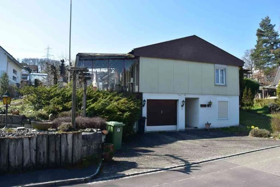 Einfamilienhaus mit eigenem Deich
