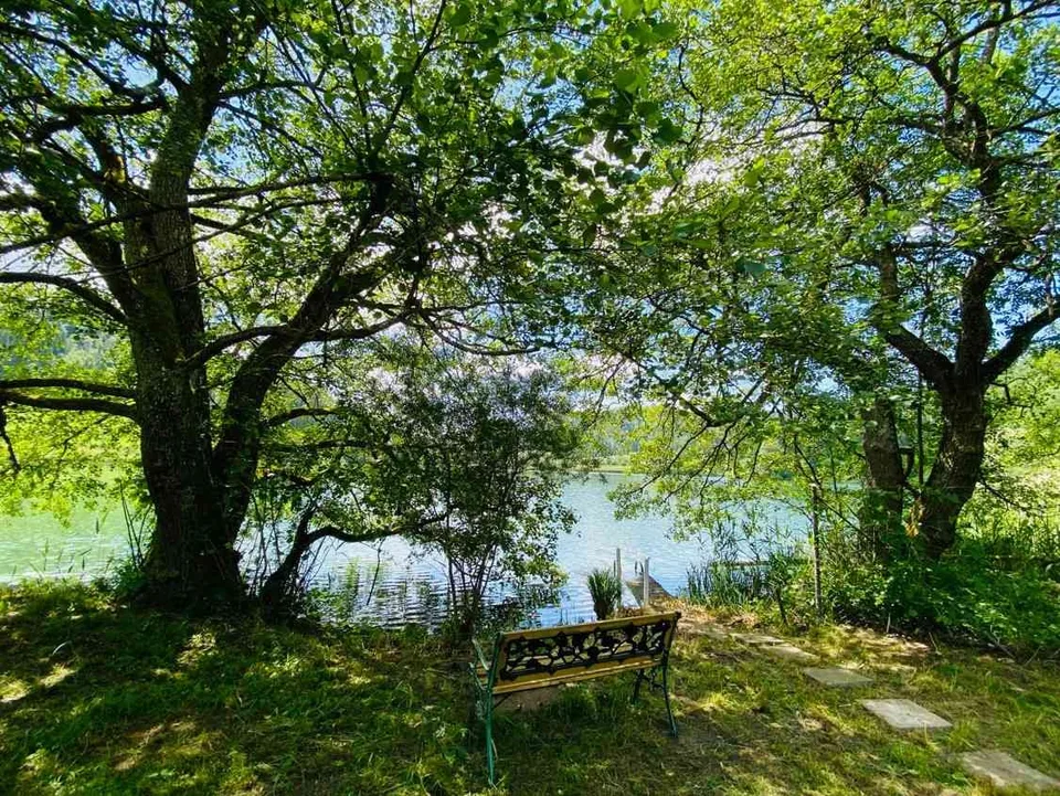 Einzigartiges Wohnen (Ferienhaus) und privatem Grundstück am See