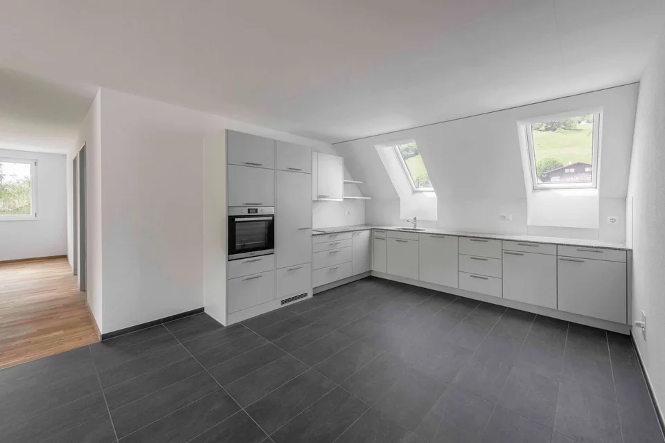 Erstvermietung 5.5 Zimmer-Wohnung DG