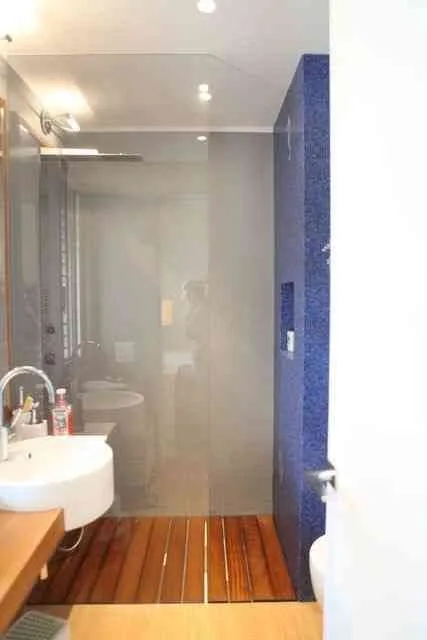 Rent luxury 6-room duplex penthouse with lake view in MontagnolaTASIS
