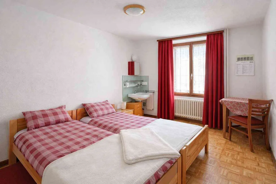 Camere arredate con spazi comuni attrezzati