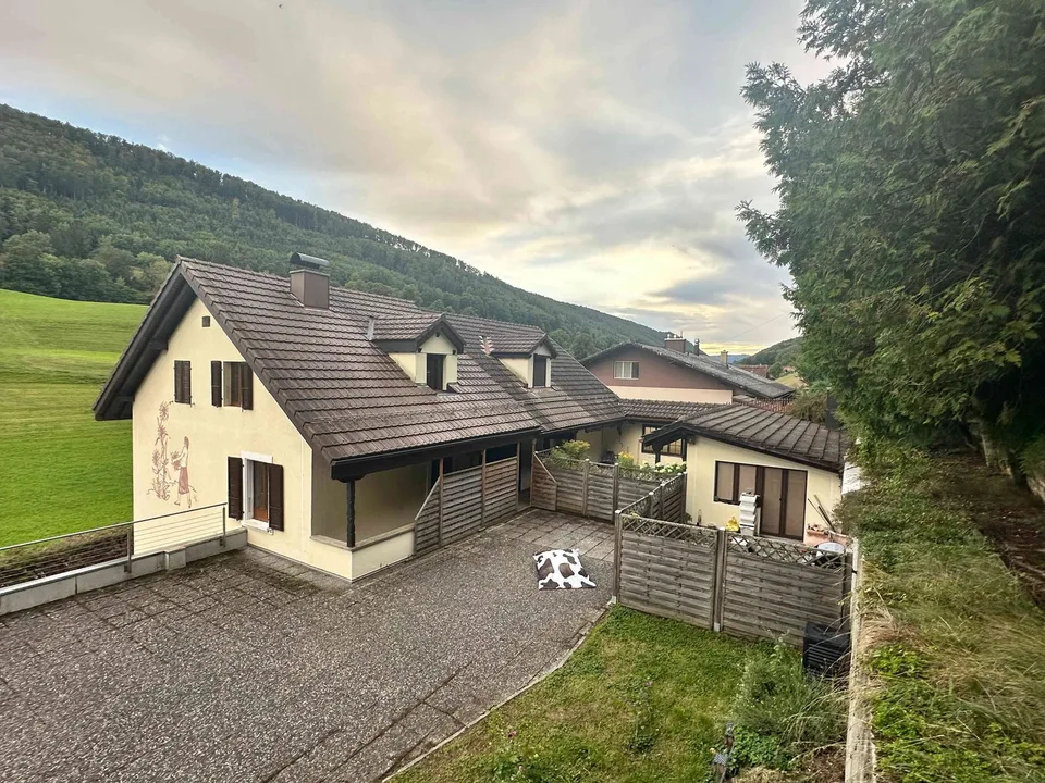 Duplex dans la verdure avec gros garage