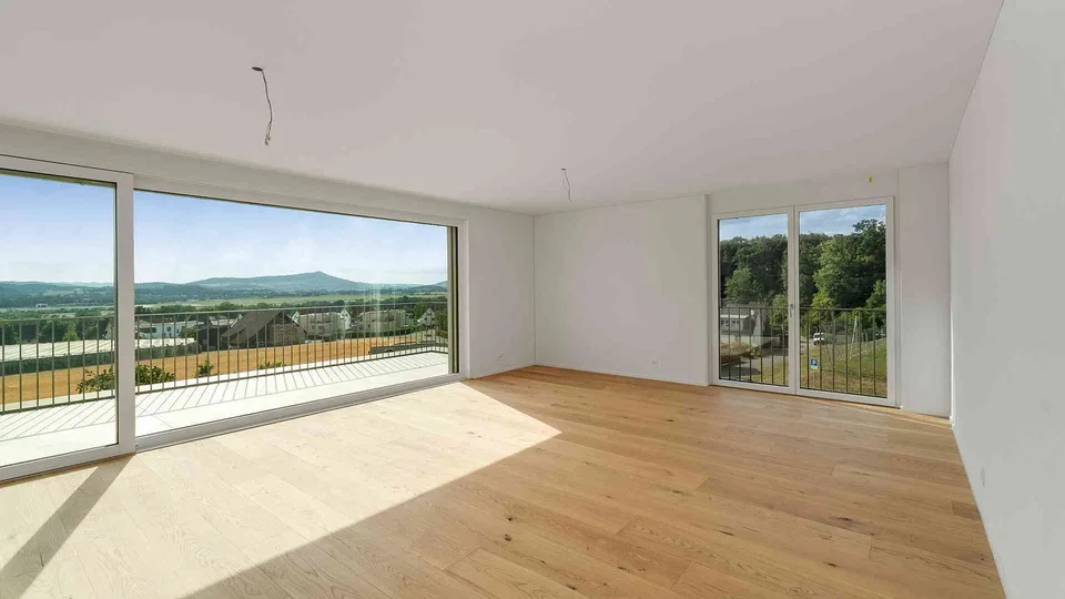 Lichtdurchflutete Attika-Maisonette mit Weitsicht und privatem Garten