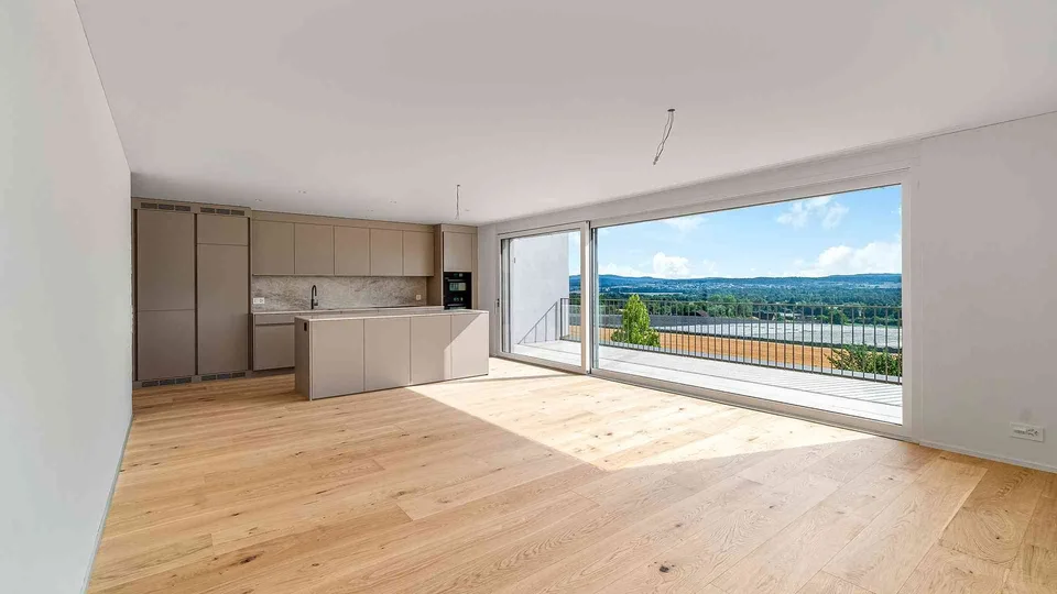 Lichtdurchflutete Attika-Maisonette mit Weitsicht und privatem Garten