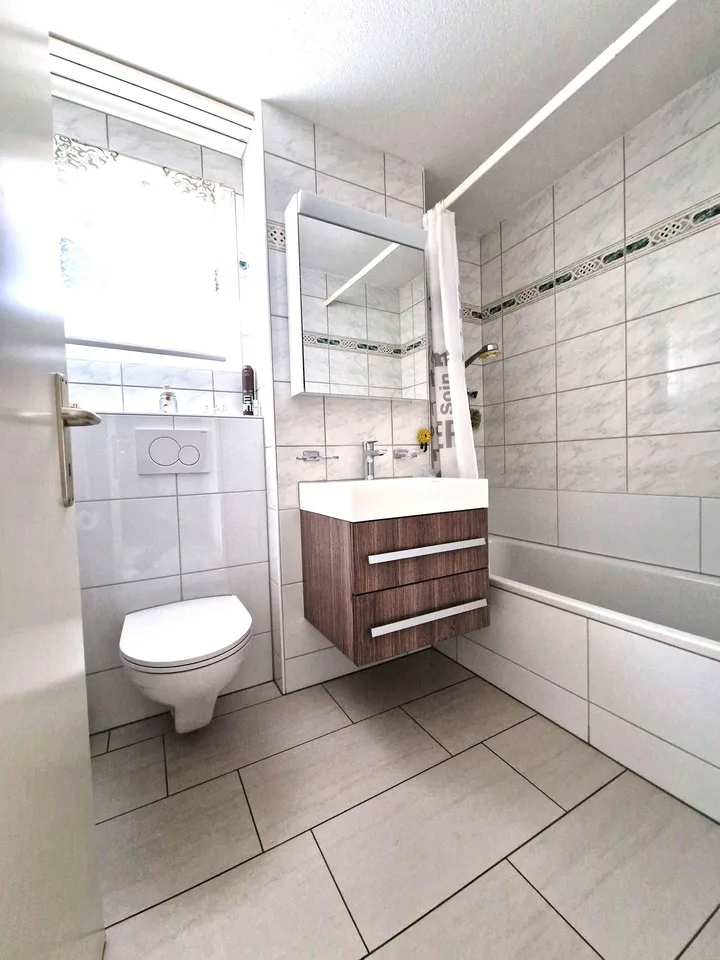 Wohnung mit Sitzplatz und Garten