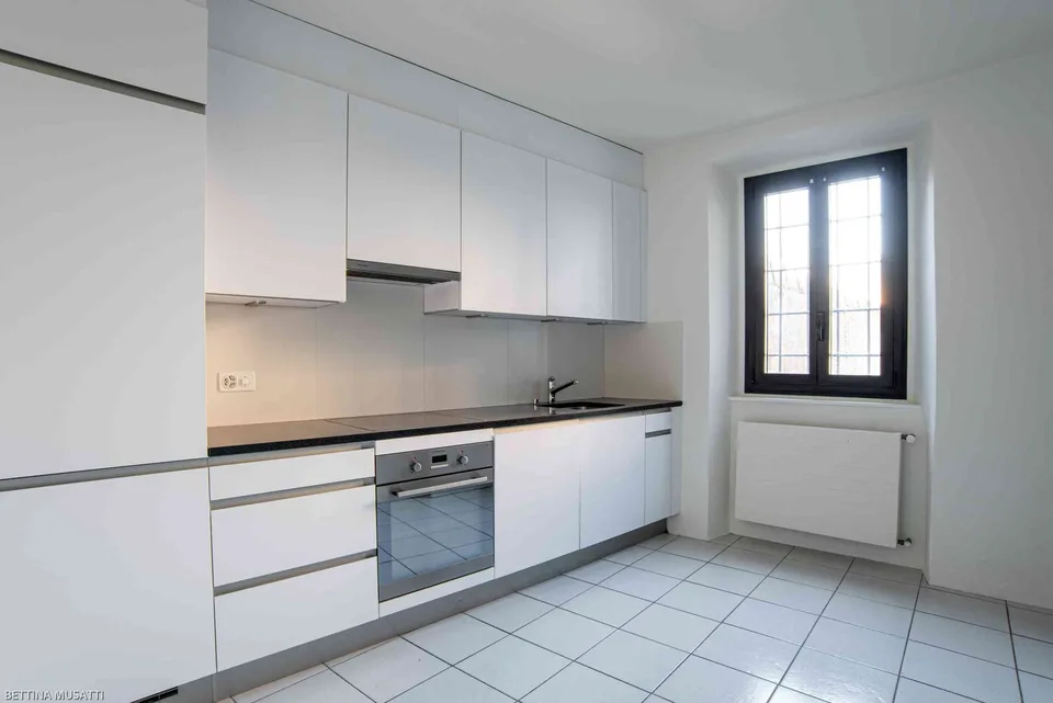appartamento 3.5 su due livelli, in casa storica con piccola corte