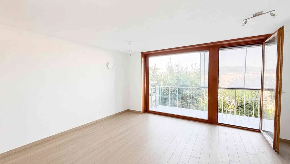 Appartement lumineux 4.5 pièces avec espace de jardin et balcon