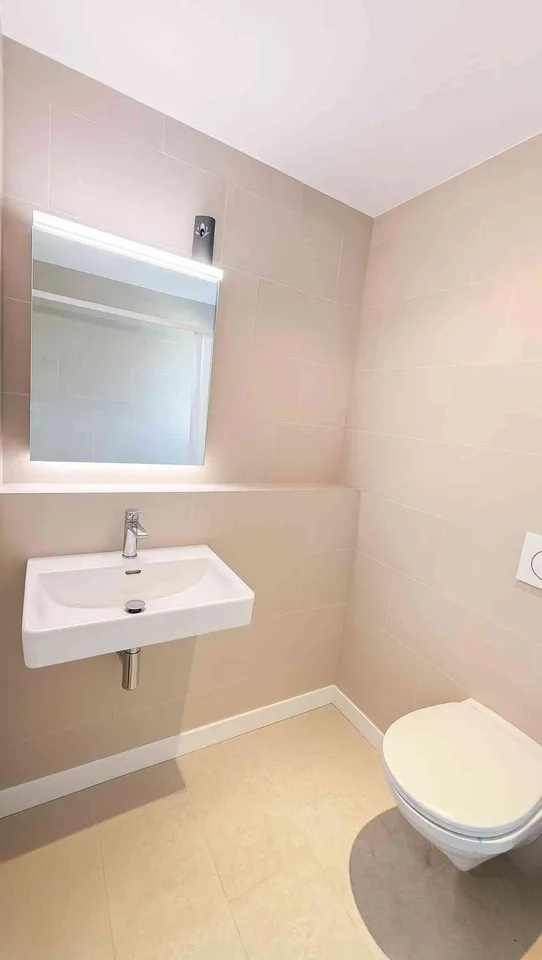 Appartement lumineux 4.5 pièces avec espace de jardin et balcon