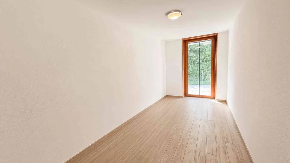 Appartement lumineux 4.5 pièces avec espace de jardin et balcon