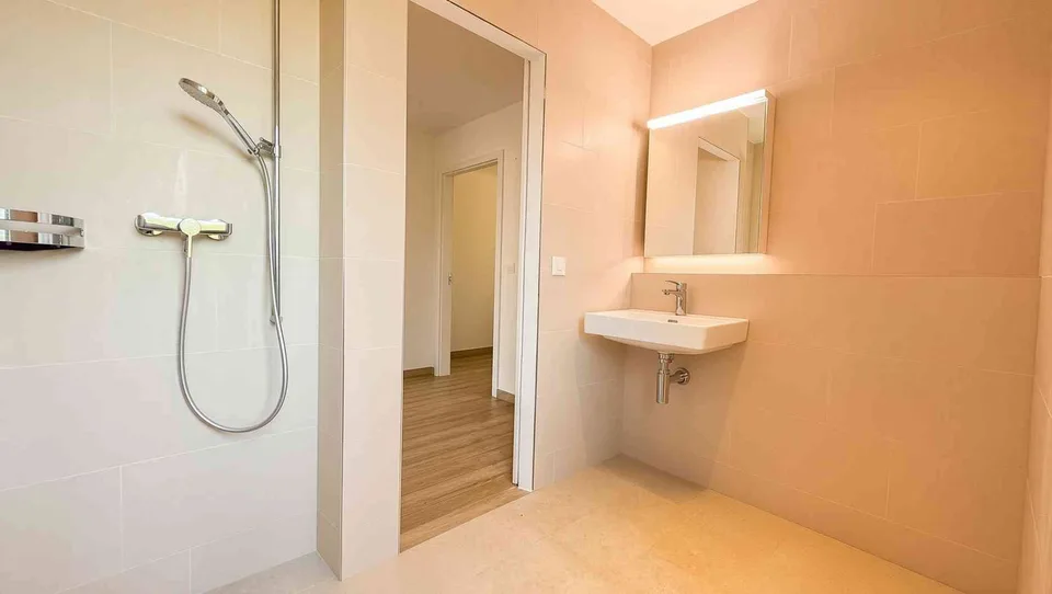 Appartement lumineux 4.5 pièces avec espace de jardin et balcon