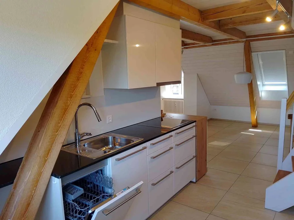 Schnuckelige Dachwohnung in Uzwil mit Aussenparkplatz und Garten