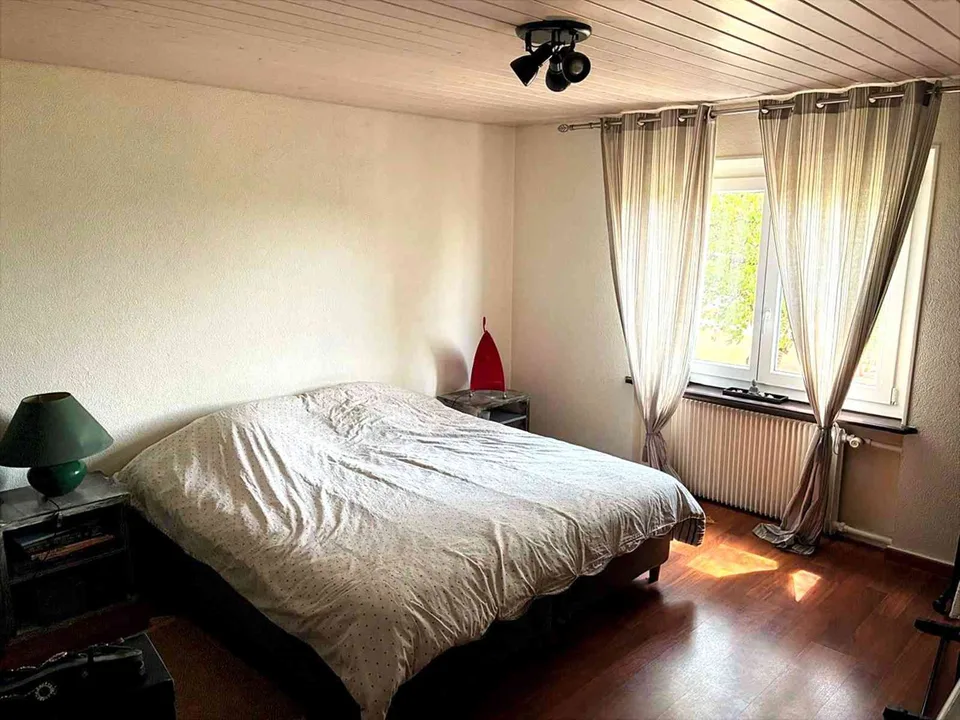 Maison individuelle avec 2 appartements, garage double