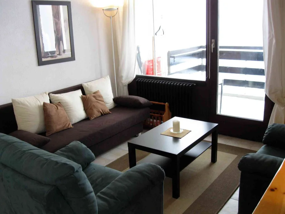 Chaleureux 2.5 pièces rénové avec balcon plein sud – Vue panoramique