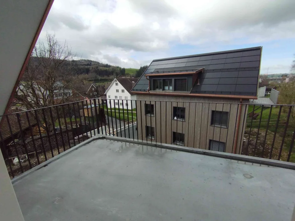 Moderne Dachgeschosswohnung mit stilvollen Holzdecken