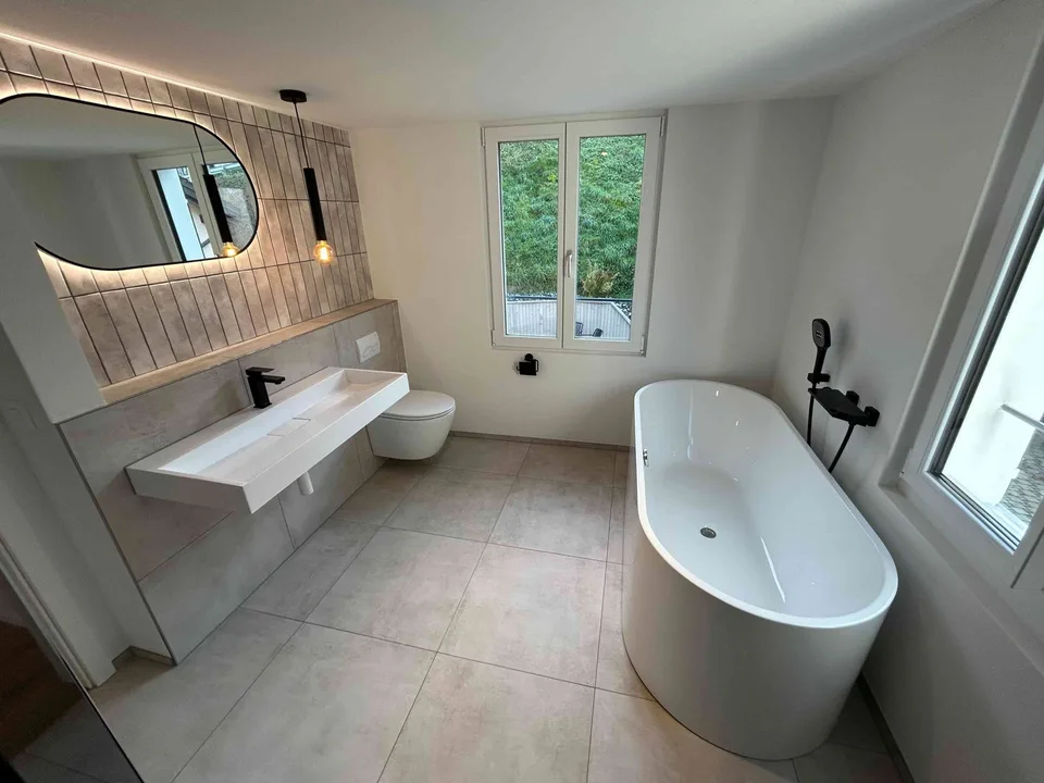 modernes Zuhause mit Einliegerwohnung – photo 4 of 12