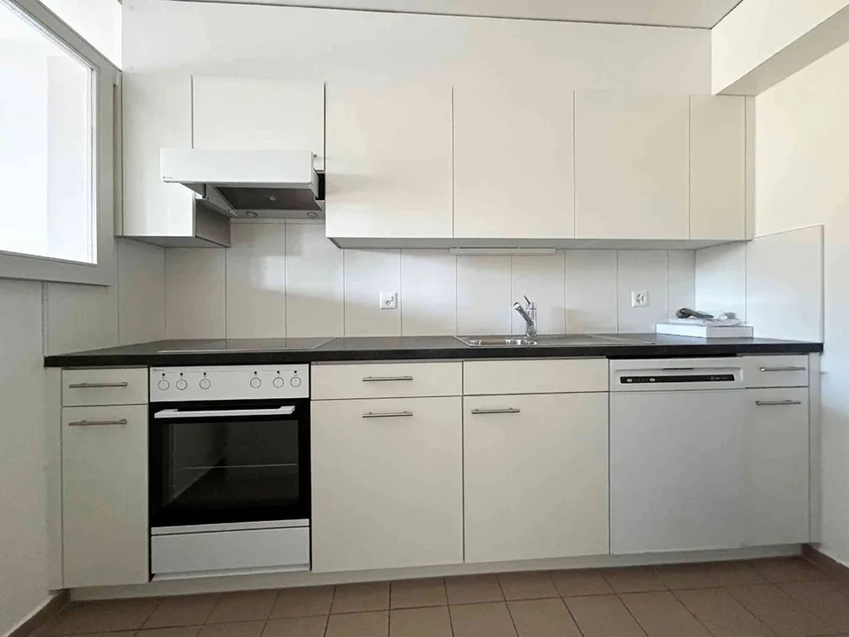 Charmant appartement de 3 pièces avec balcon à Villars-sur-Glâne