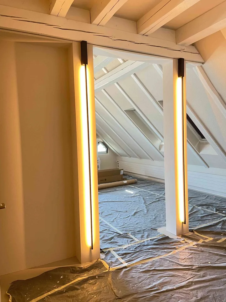 Exceptional Attic Apartment in Thalwil with 180° Views of Lake Zurich
