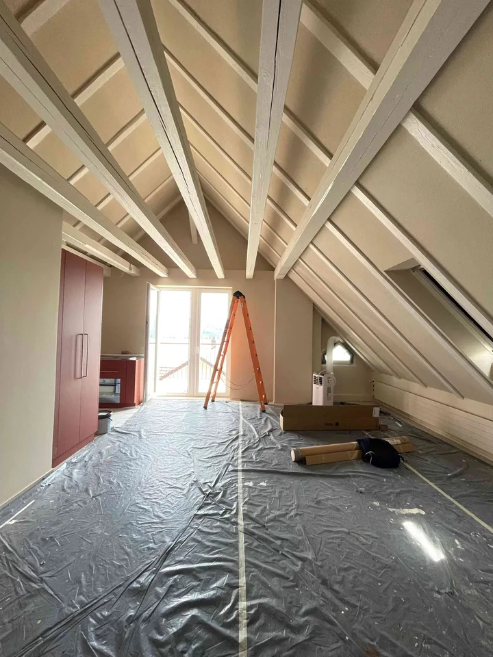 Exceptional Attic Apartment in Thalwil with 180° Views of Lake Zurich