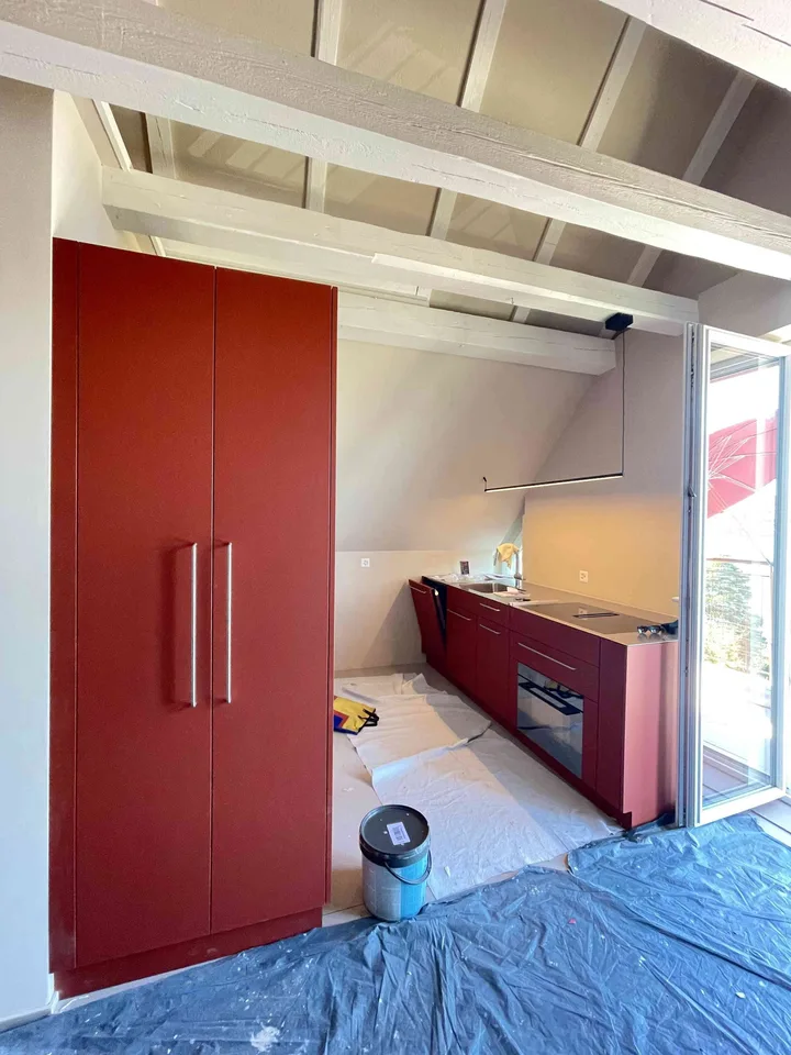 Exceptional Attic Apartment in Thalwil with 180° Views of Lake Zurich