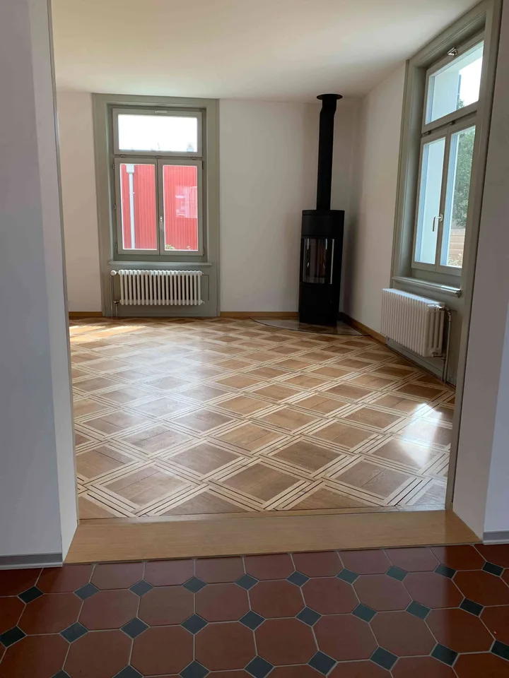 aussergewöhnliche Wohnung in denkmalgeschütztem Zweifamilienhaus
