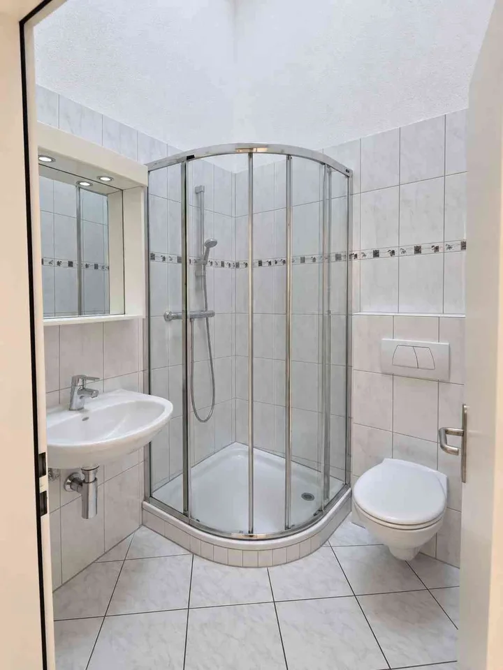 Helle Dachwohnung an zentraler Lage – photo 6 of 12