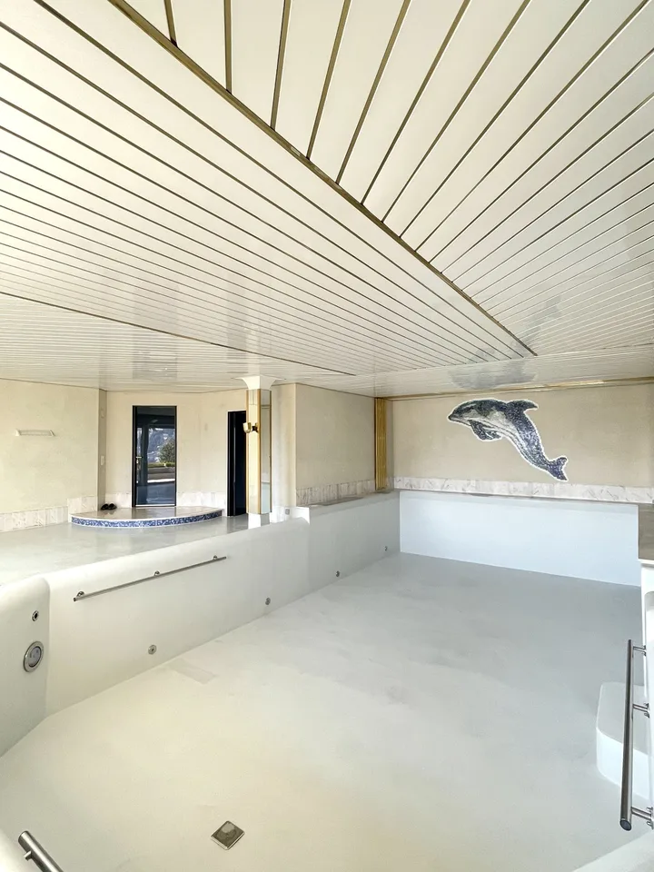 Appartamento di pregio su tre livelli con piscina condominiale – foto 20 di 23