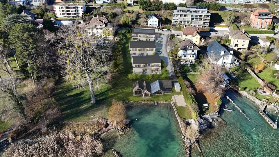 Die Ufer von Gorgier 9 aneinandergereihte Villen am Wasser