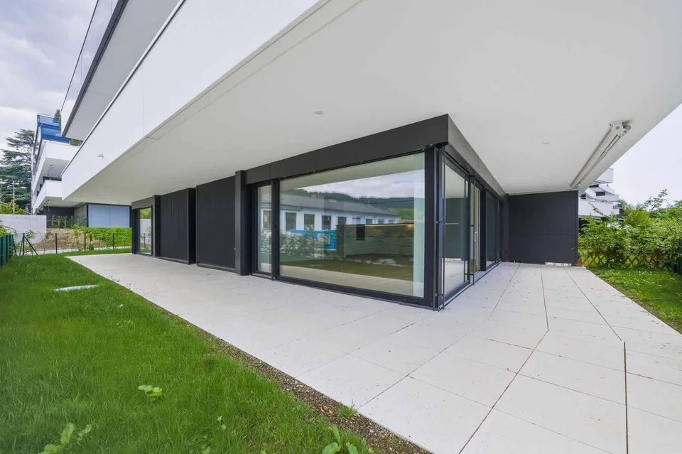Appartement neuf de standing - 5.5 pièces en angle avec terrasse et jardin privatif