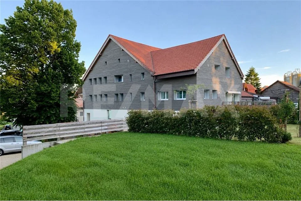 Außergewöhnliche Wohnung in renoviertem Bauernhof mit Garten, nur zwei Schritte von Estavayer-le-Lac entfernt