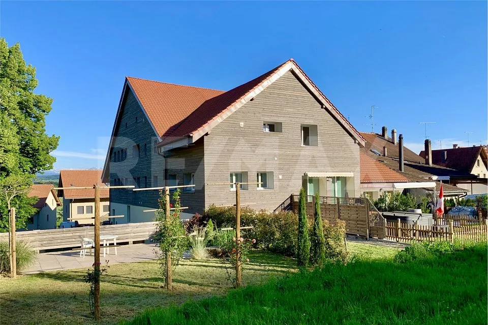 Appartement d'exception dans ferme rénovée avec jardin, à deux pas d'Estavayer-le-Lac