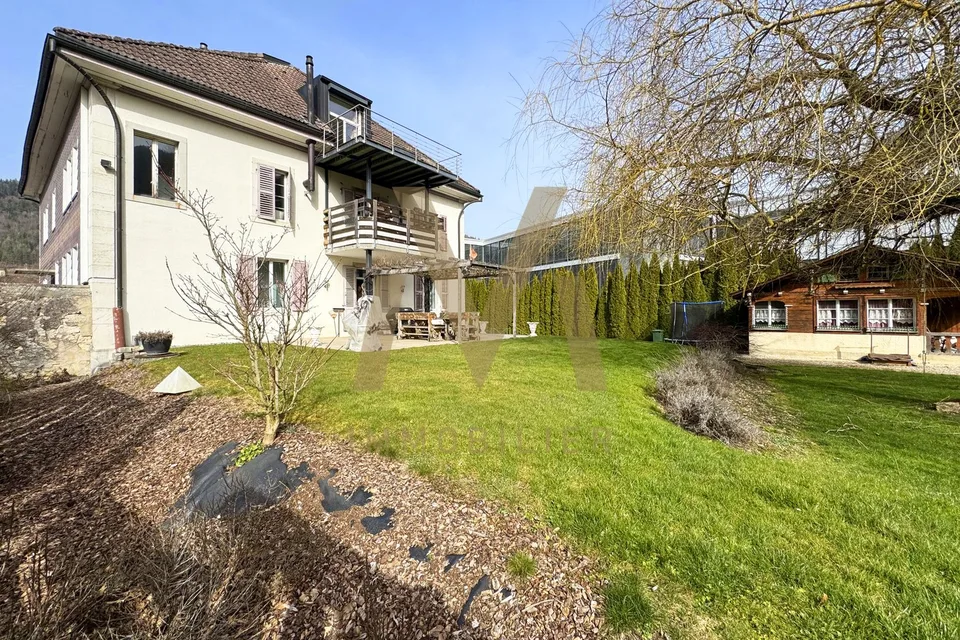 Immeuble de rendement avec terrain constructible