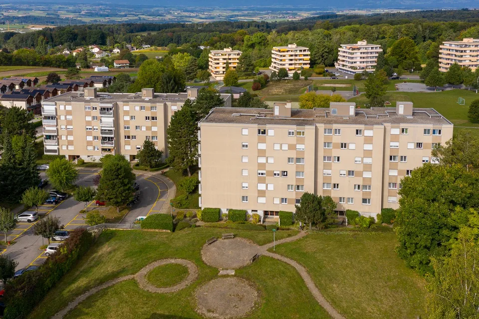Place de parc à Romanel - Parking intérieur