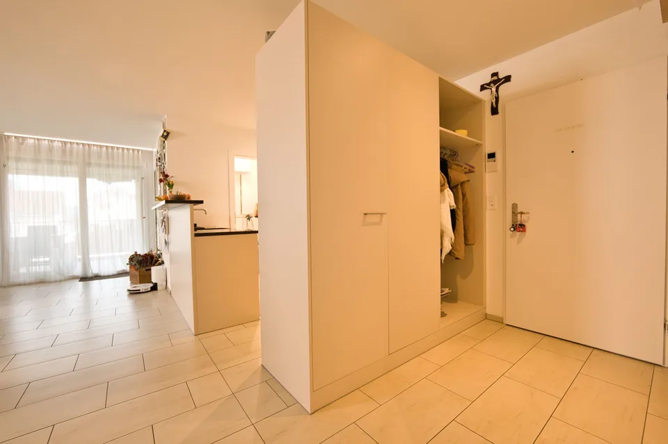 Appartement exclusif 4.5 pièces avec balcon, cave & station de recharge E à proximité d'un parking