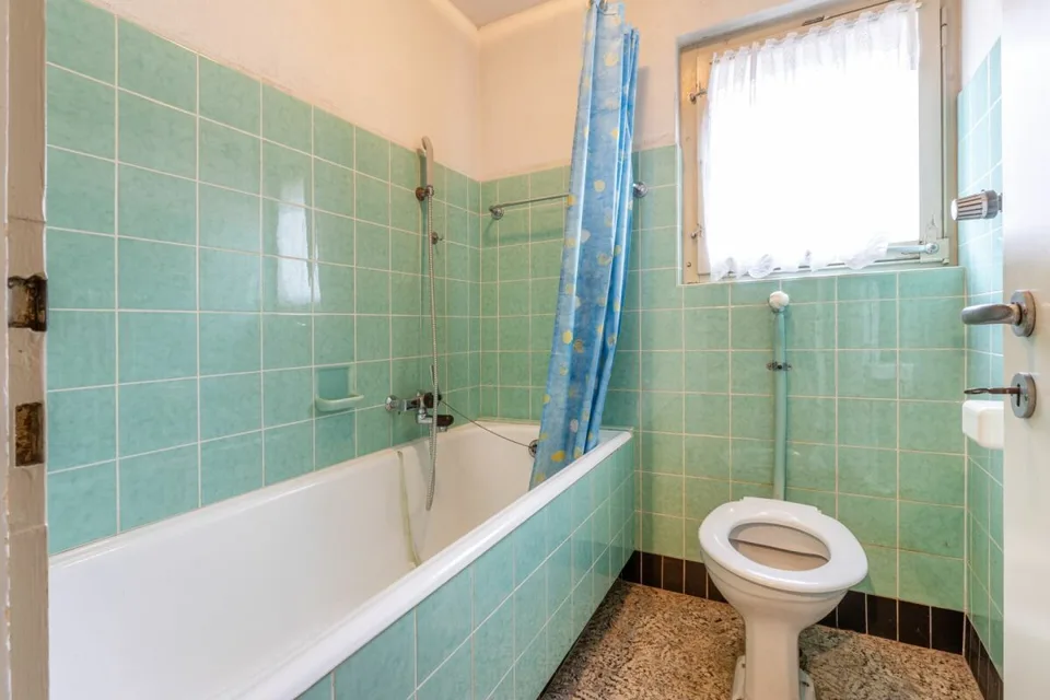 Casa colonica ricca di potenziale con tre unità abitative e fienile – foto 24 di 30