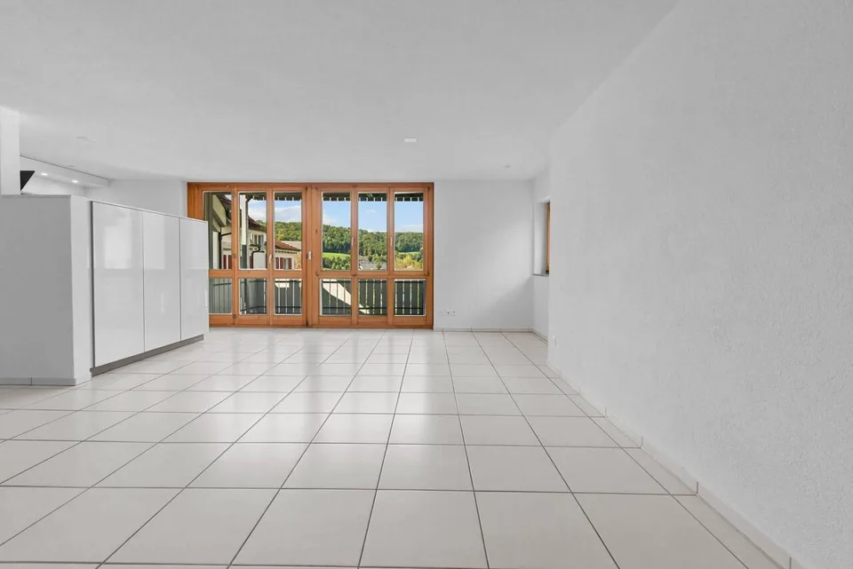 Appartamento mansardato luminoso in una posizione idillica con balcone!